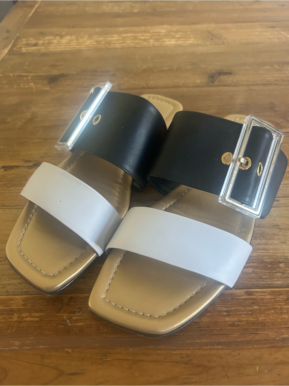 Agl Two-Tone Black and White Slide Sandals with Clear Buckle